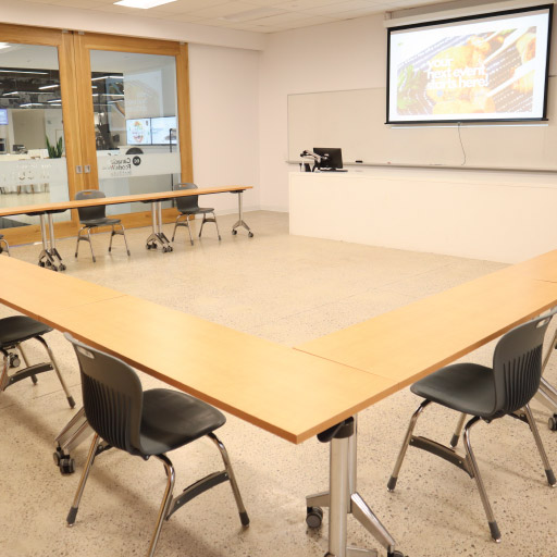 Suite 1874 for business meetings with projector and whiteboard at Niagara College Aurora Armoury
